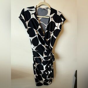 Elegant Maggie London Black and White Pattern Wrap Dress